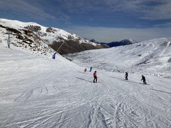 Skiing down Llac red slope
