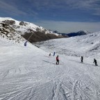 Skiing down Llac red slope