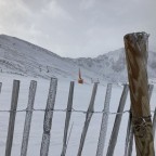 The snow was covering the fences