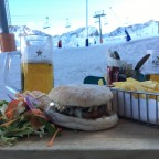 Refuelling with a beer & burger on Pas83 Terrace