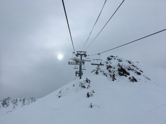 Atmospheric skies above the Font Negre chairlift